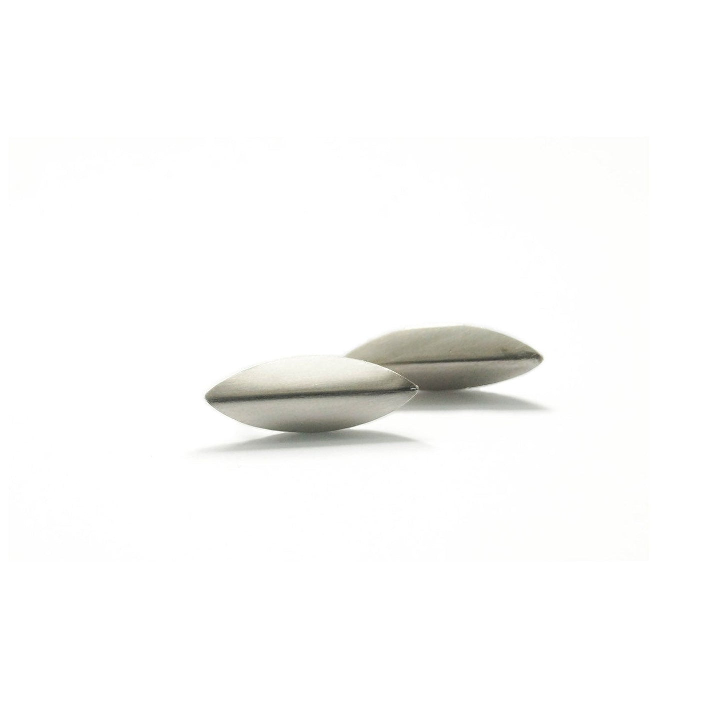 Korthi Stud Earrings